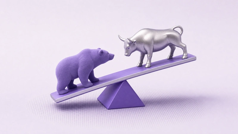 A flocked violet bear and satin silver bull balanced on a seesaw